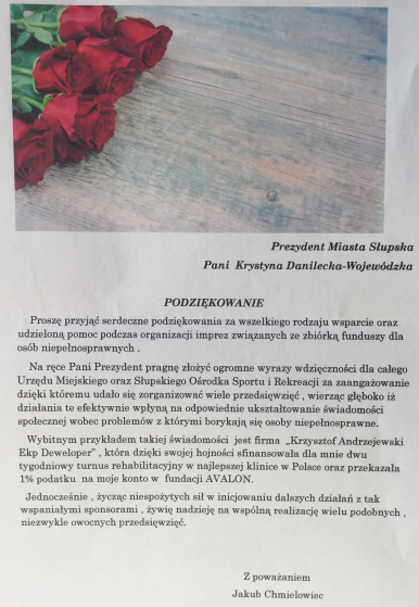 Na zdjęciu widzimy podziękowanie od Pana Jakuba Chmielowca dla Pani Prezydent - treść opisana w artykule. W lewym , górnym rogu - bukiet róż.