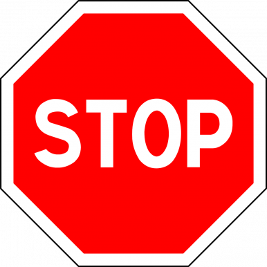 N zdjęciu widzimy znak STOP - biały napis na czerwonym tle