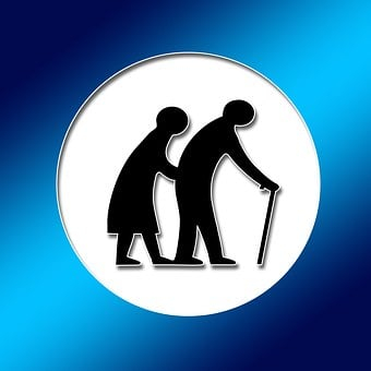 na zdjęciu czarny piktogram vprzedstawiający seniorów w białym kole, a koło wpisane jest w granatowo-niebieski kwadrat (fot. pixabay)