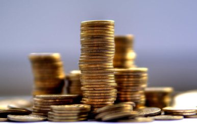 obraz prezentujący stosy złotych monet