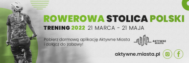 Pani jadąca na rowerze.