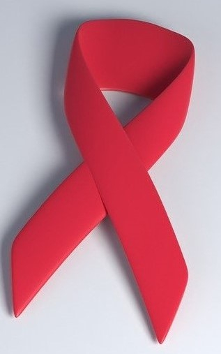 Na zdjęciu czerwona wstążka - symbol walki z rakiem