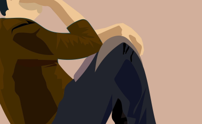 Na zdjęciu mężczyzna siedzący oparty plecami, podpiera głowę prawą ręką