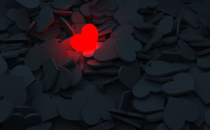 Na obrazku widzimy kilkadziesiąt serc szarych  i jedno rozgrzane czerwone