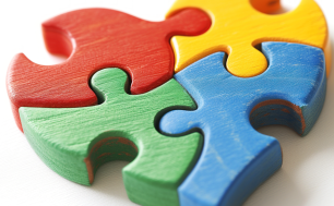 Na zdjęciu serce ułożone z kolorowych puzzli