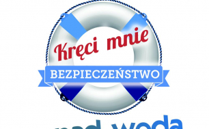 Grafika biało - niebieska  kołó ratunkowe a na nim napis czerwony "Kręci mnie bezpieczeństwo".